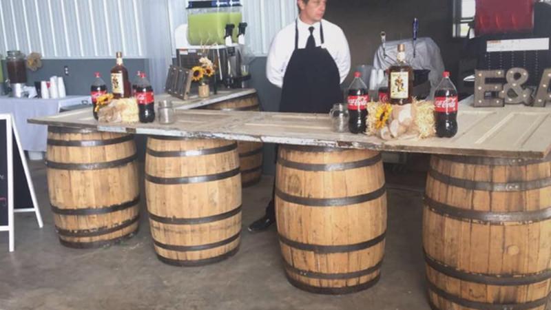 whiskey barrel drink bar for special event by old oaks vintage rentals